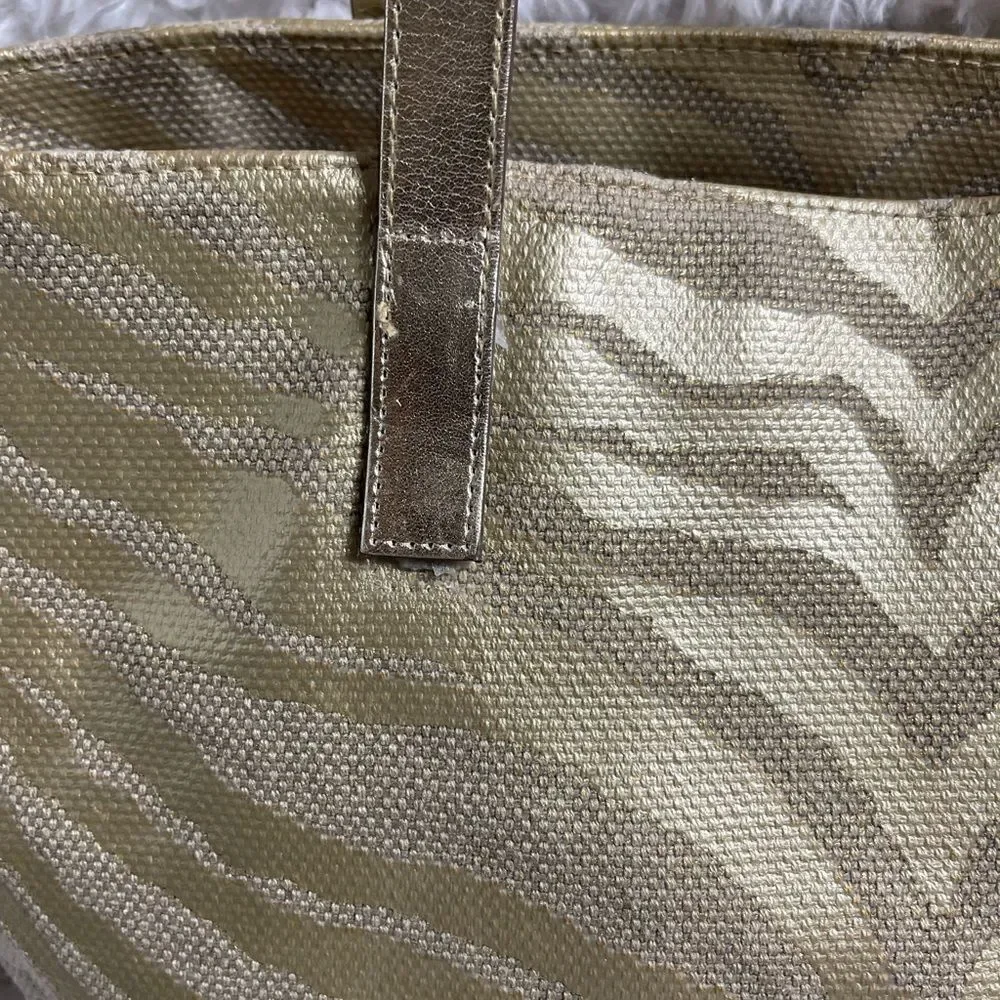 Michael Kors Metallic gold zebra print large tote gold tone hardwares and straps
